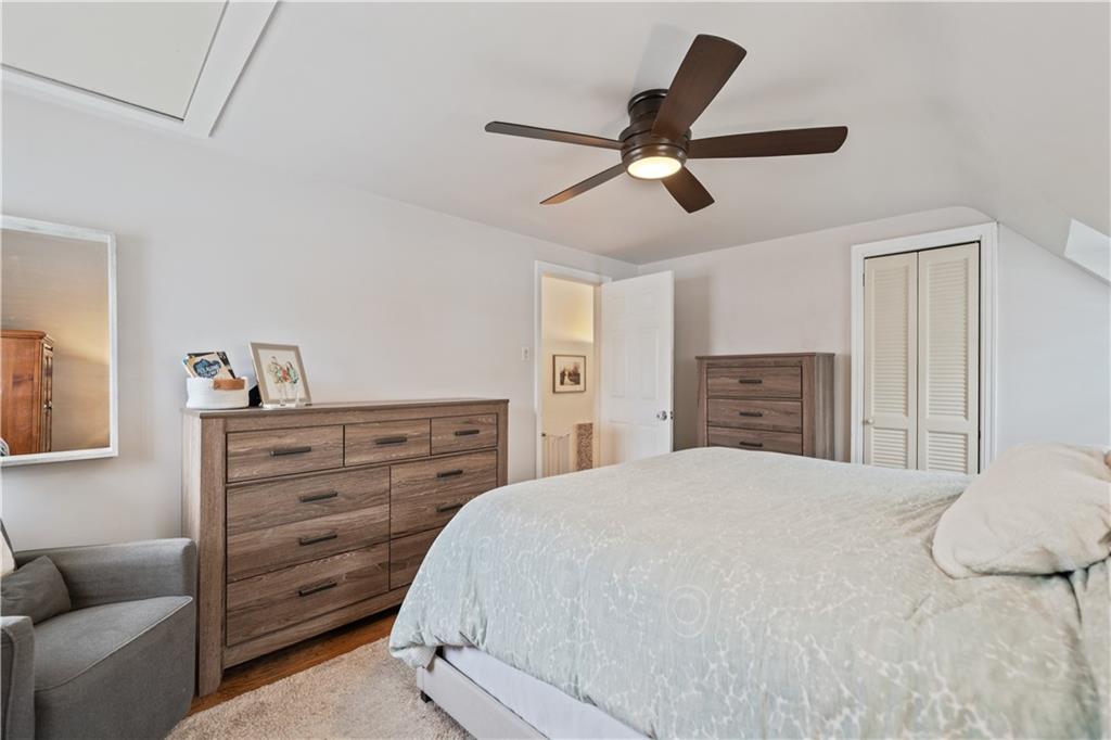 315 Vanadium Road Pittsburgh, PA 15243 - Photo 17 of 39 a bedroom with a bed and furniture