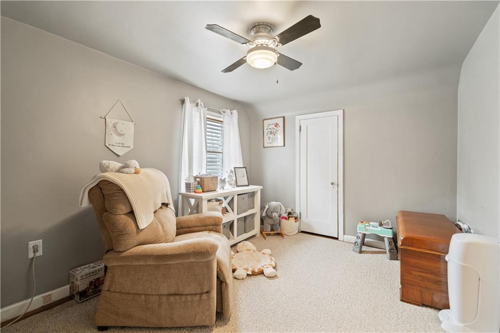 315 Vanadium Road Pittsburgh, PA 15243 - Photo 19 of 39 a living room with furniture and a ceiling fan