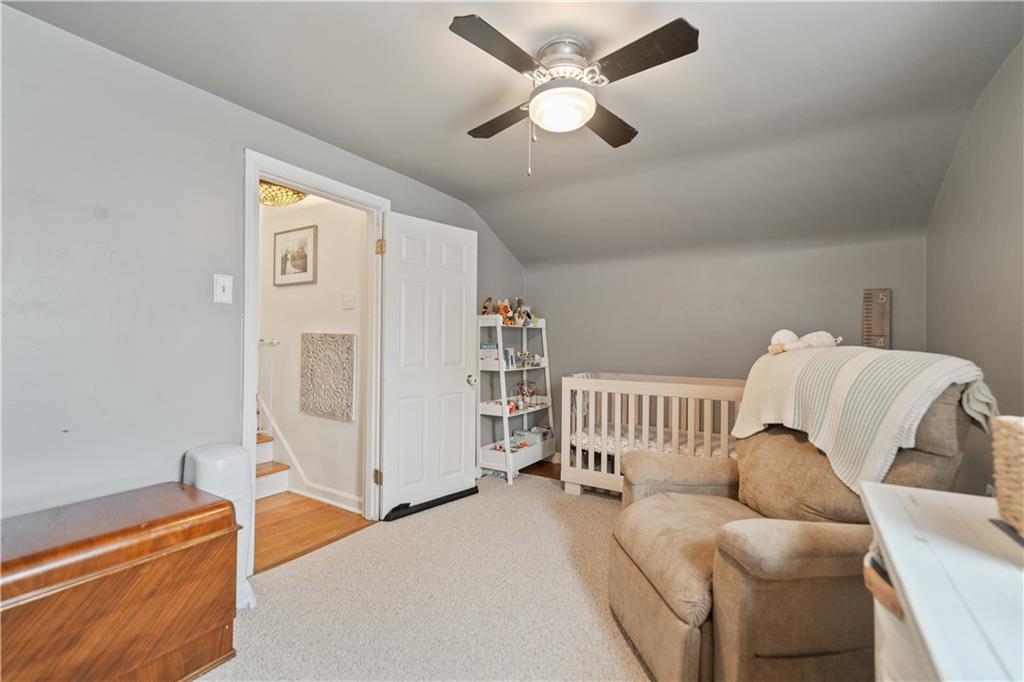 315 Vanadium Road Pittsburgh, PA 15243 - Photo 20 of 39 a bedroom with furniture and a ceiling fan