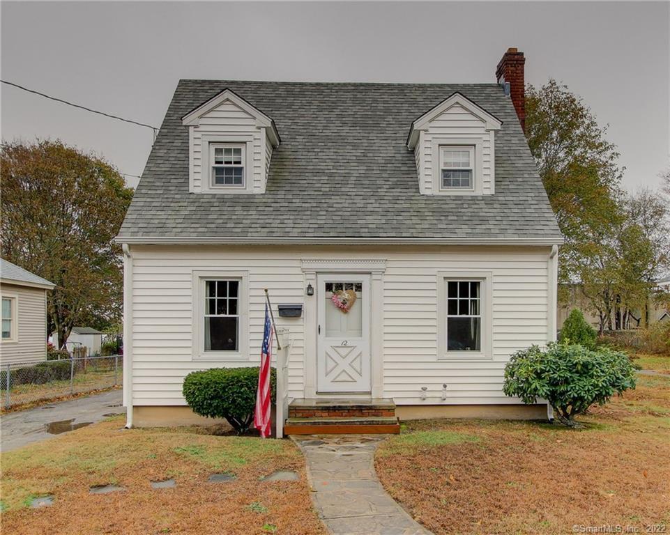 12 Maple Avenue Clinton, CT 06413 - Photo 1 of 1 a front view of a house with garden