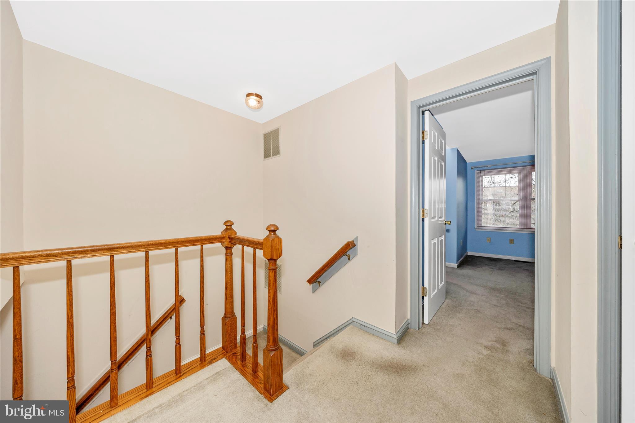8007 Broken Reed Court Frederick, MD 21701 - Photo 22 of 72 a view of a hallway with staircase