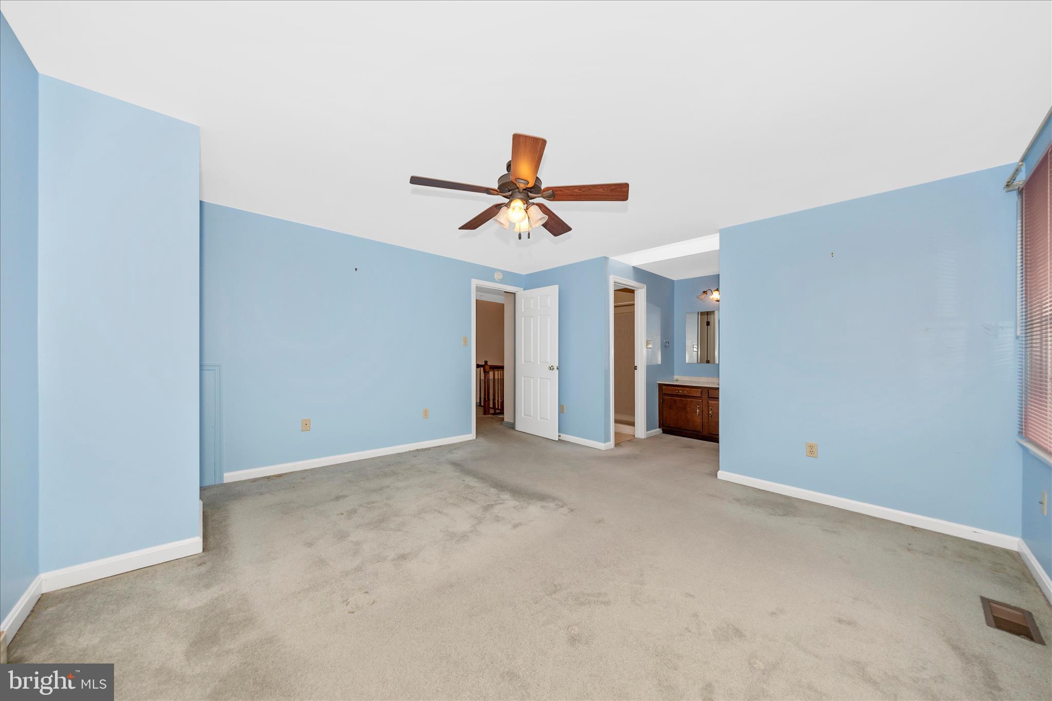 8007 Broken Reed Court Frederick, MD 21701 - Photo 25 of 72 a view of a livingroom with a ceiling fan