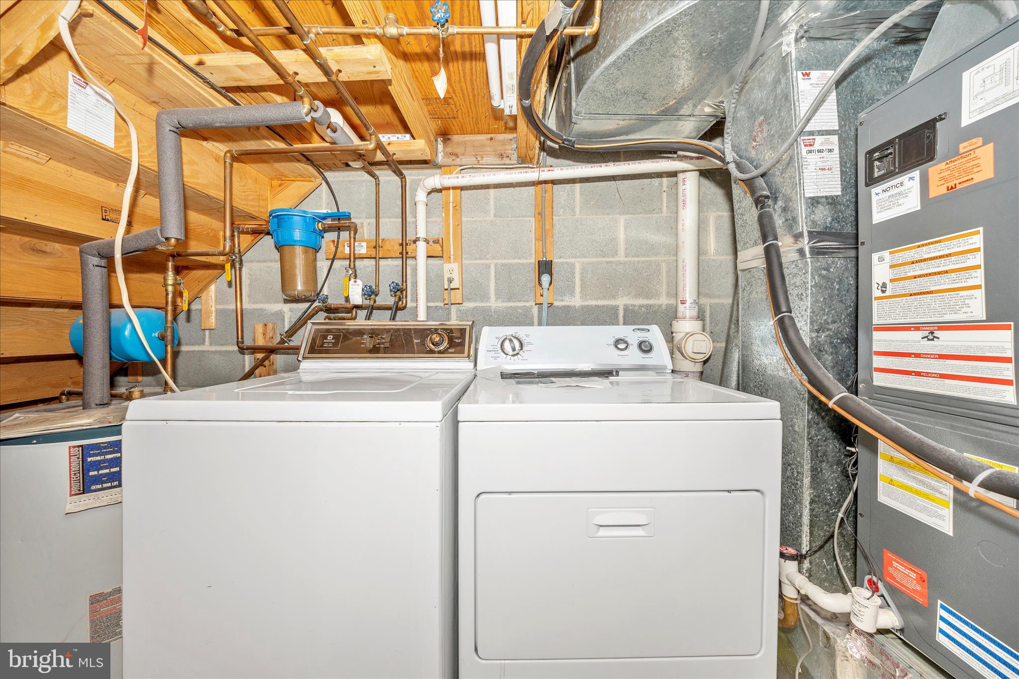8007 Broken Reed Court Frederick, MD 21701 - Photo 36 of 72 a utility room with dryer and washer