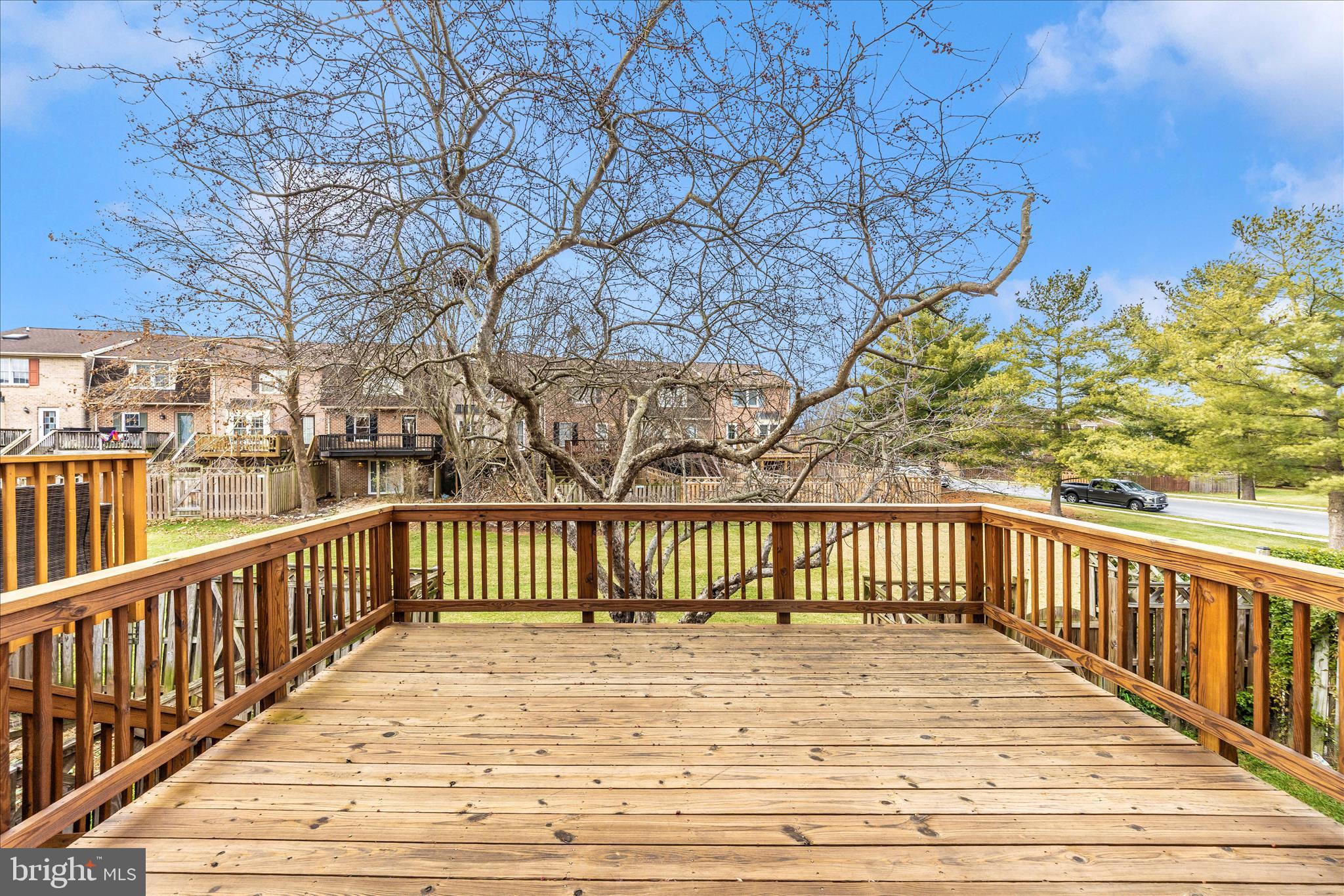 8007 Broken Reed Court Frederick, MD 21701 - Photo 38 of 72 a view of a balcony with wooden floor and fence