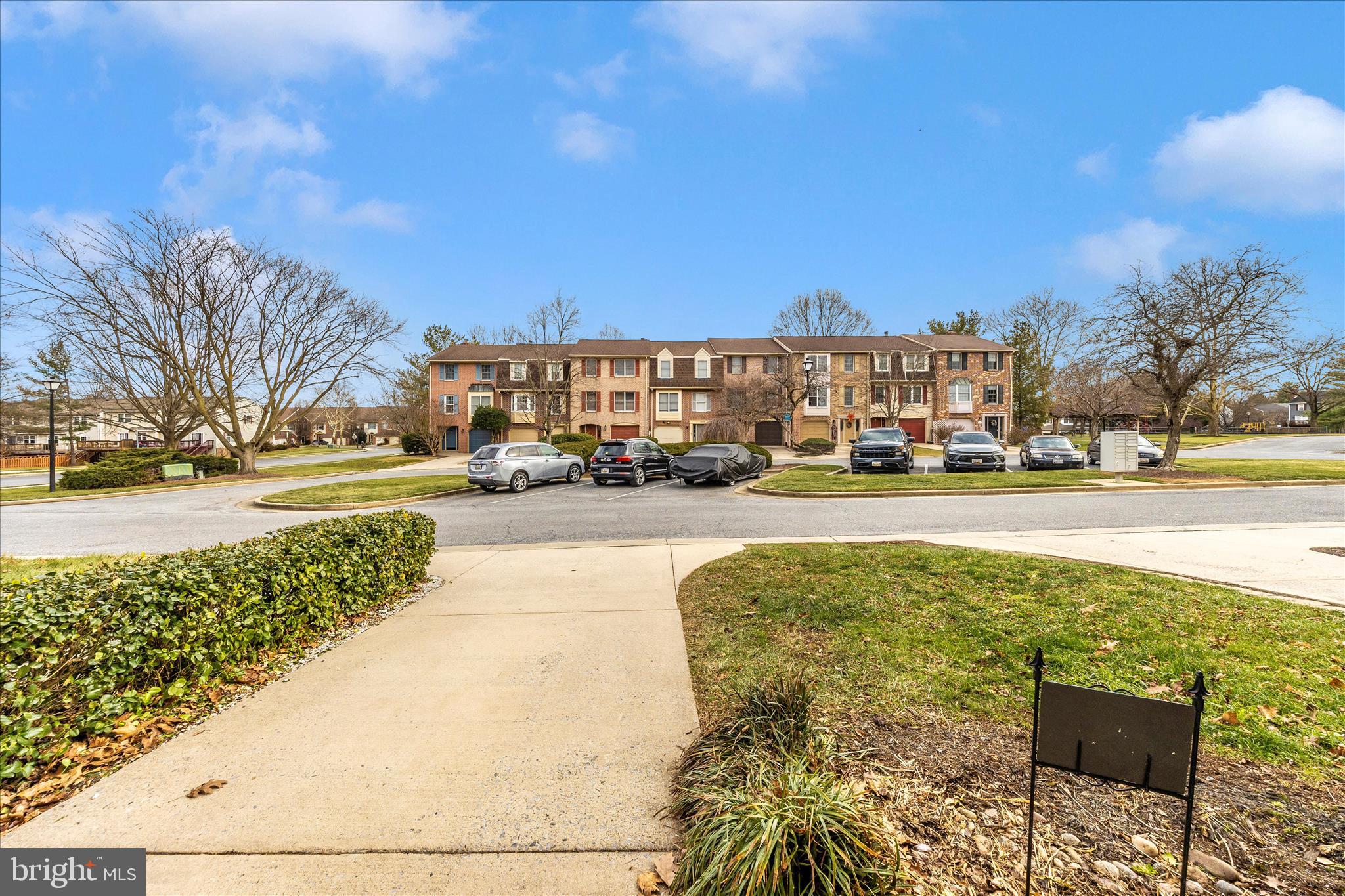 8007 Broken Reed Court Frederick, MD 21701 - Photo 48 of 72 a view of a swimming pool and a cars park