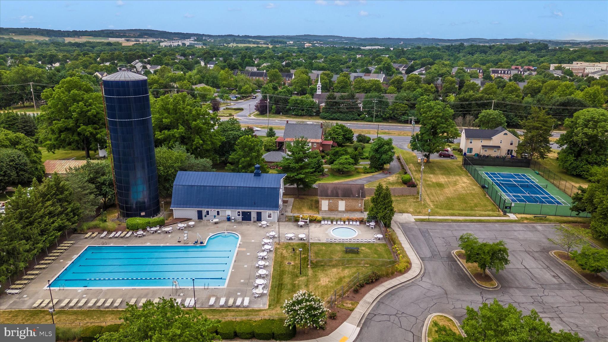 8007 Broken Reed Court Frederick, MD 21701 - Photo 55 of 72 an aerial view of a house with swimming pool garden and mountain view