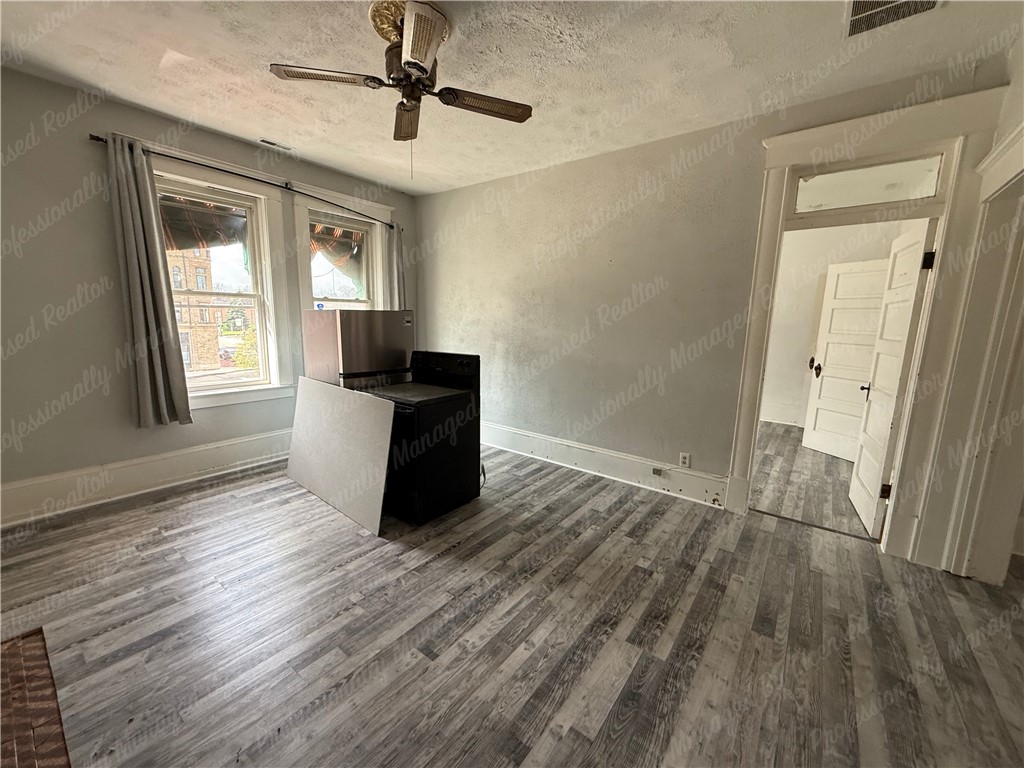 44 West High Street, Unit D Springfield, OH 45502 - Photo 7 of 25 This versatile room features durable flooring and abundant natural light.