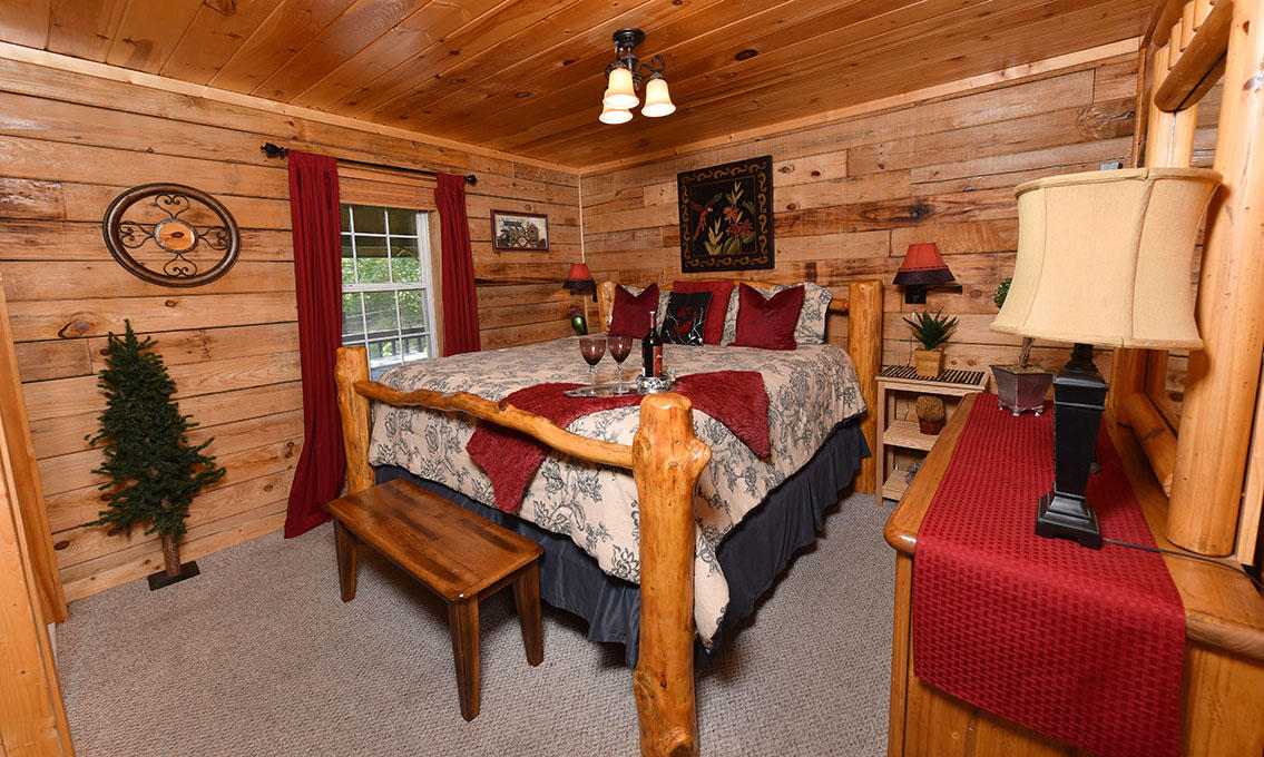 1555 Trappers Ridge Sevierville, TN 37862 - Photo 27 of 38 pigeon-forge-cabin-serendipity-bedroom-1