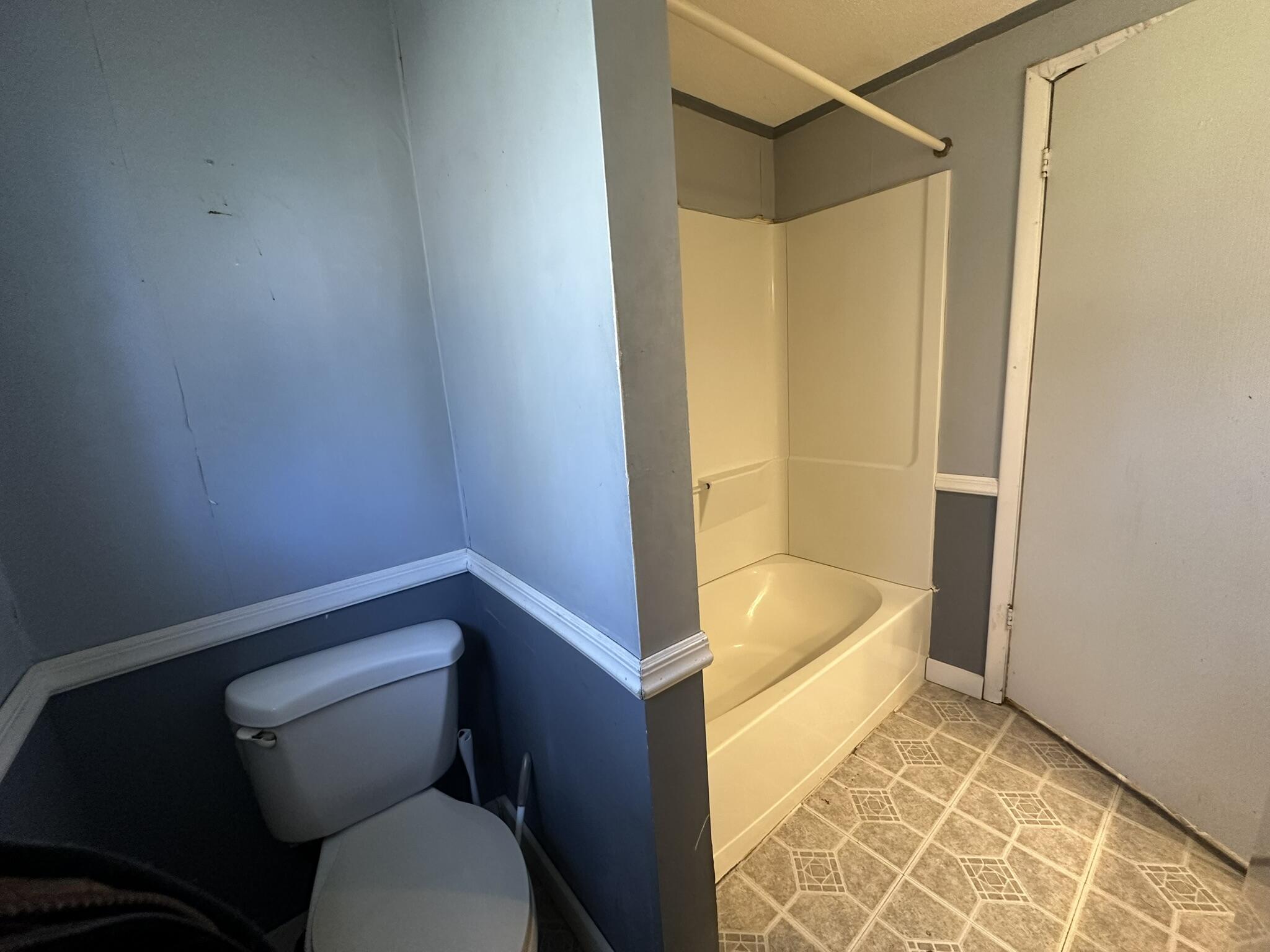 6 Old Post Road Tobyhanna, PA 18466 - Photo 13 of 32 a bathroom with a toilet and shower