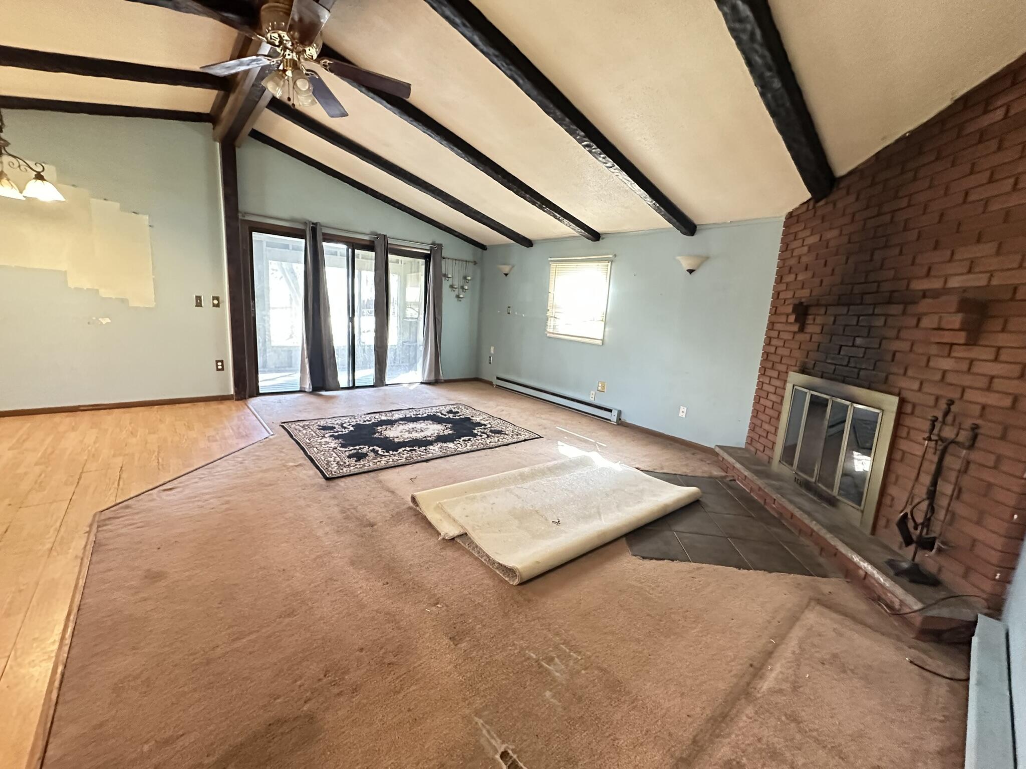 6 Old Post Road Tobyhanna, PA 18466 - Photo 22 of 32 a view of an empty room with a fireplace and a window
