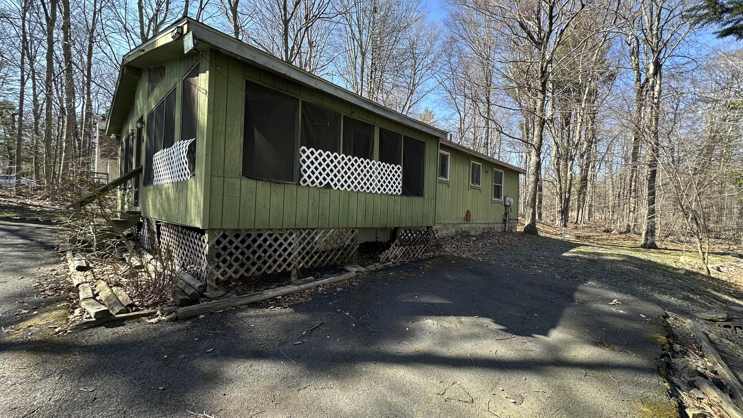 6 Old Post Road Tobyhanna, PA 18466 - Photo 25 of 32 a front view of a house with a yard