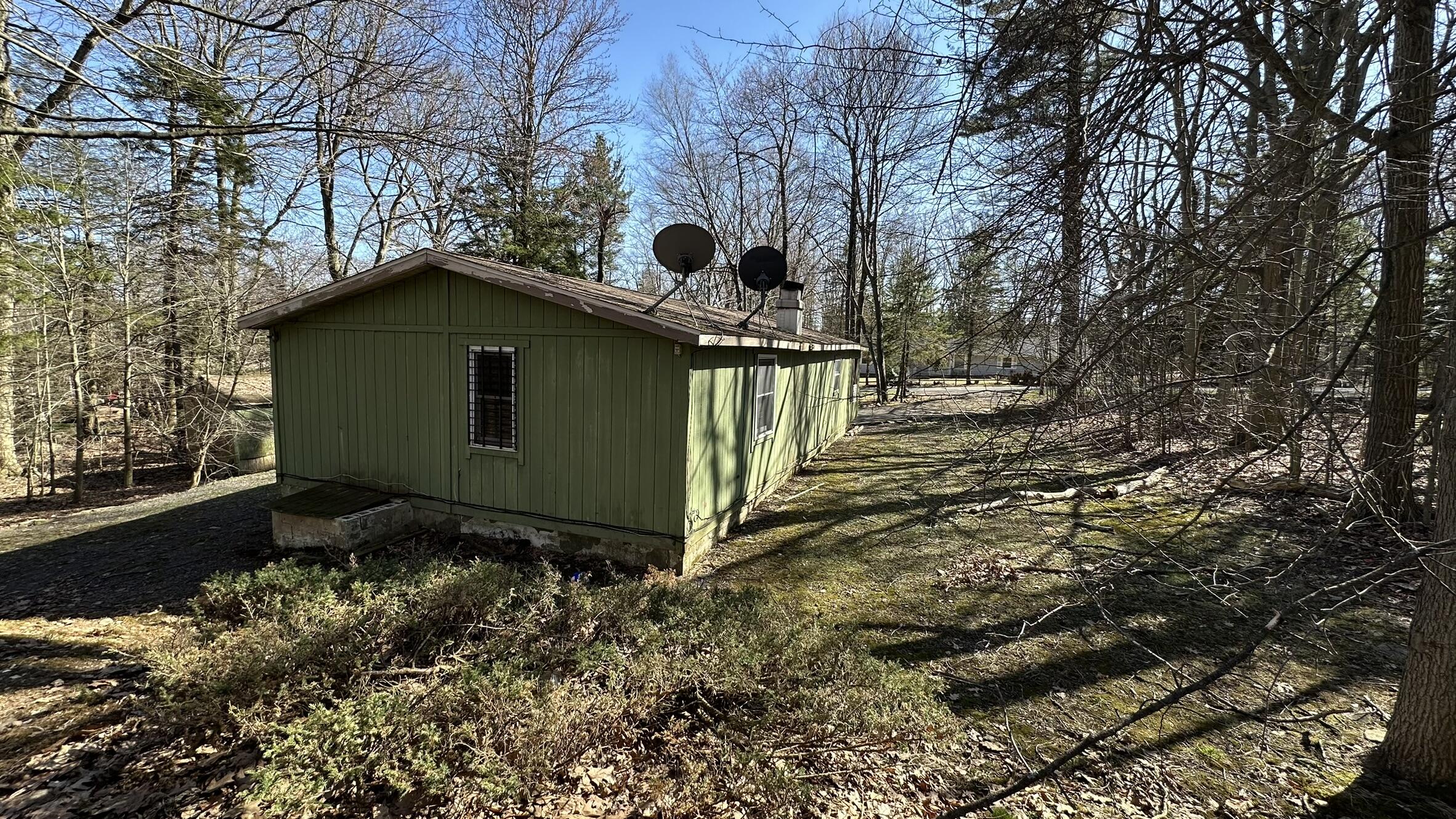 6 Old Post Road Tobyhanna, PA 18466 - Photo 28 of 32 a pathway of a house with a yard