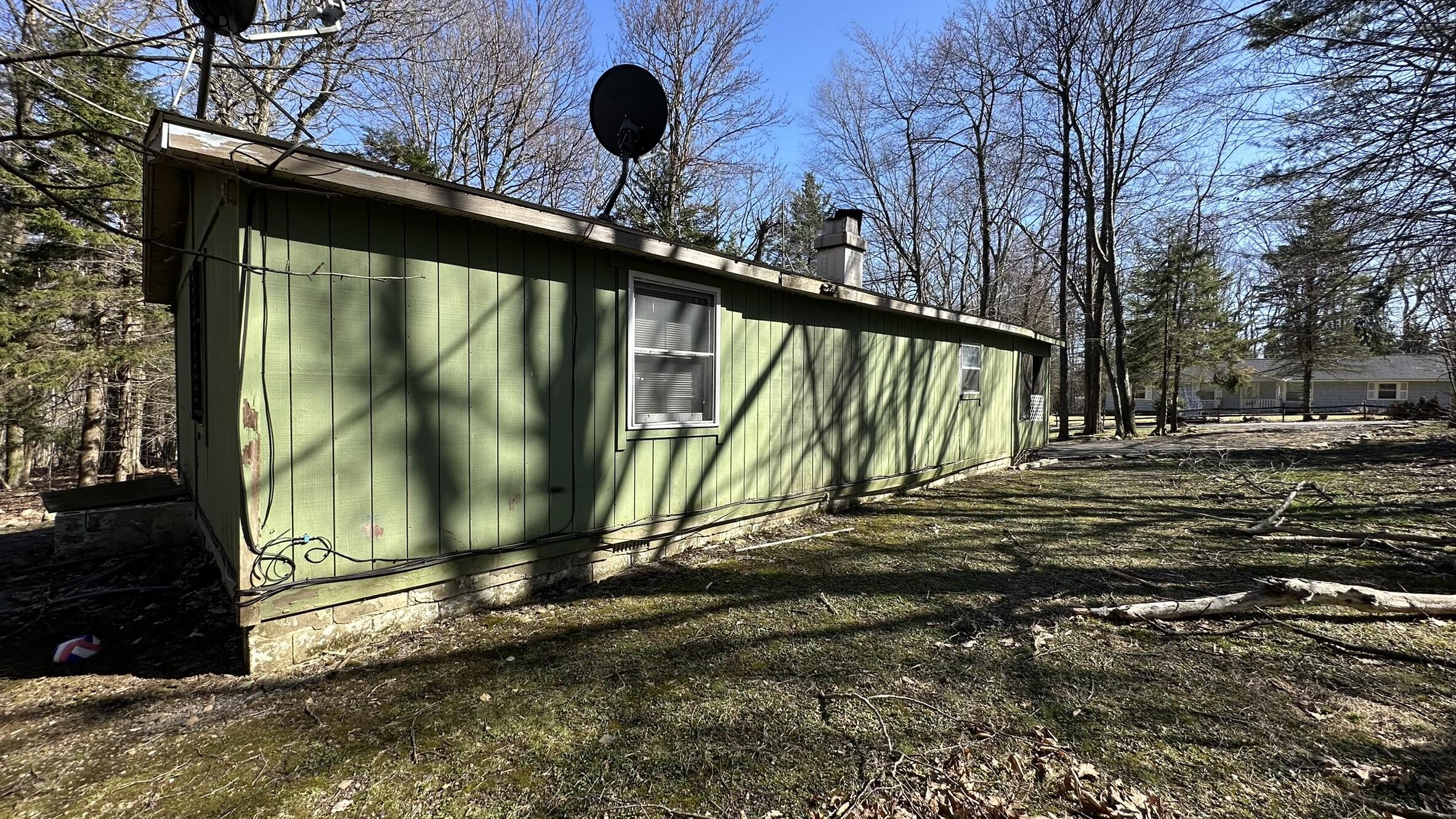 6 Old Post Road Tobyhanna, PA 18466 - Photo 30 of 32 a front view of a house with a yard
