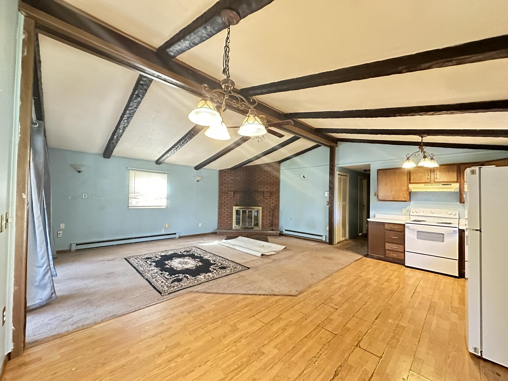 6 Old Post Road Tobyhanna, PA 18466 - Photo 5 of 32 a bedroom with a bed and a chandelier