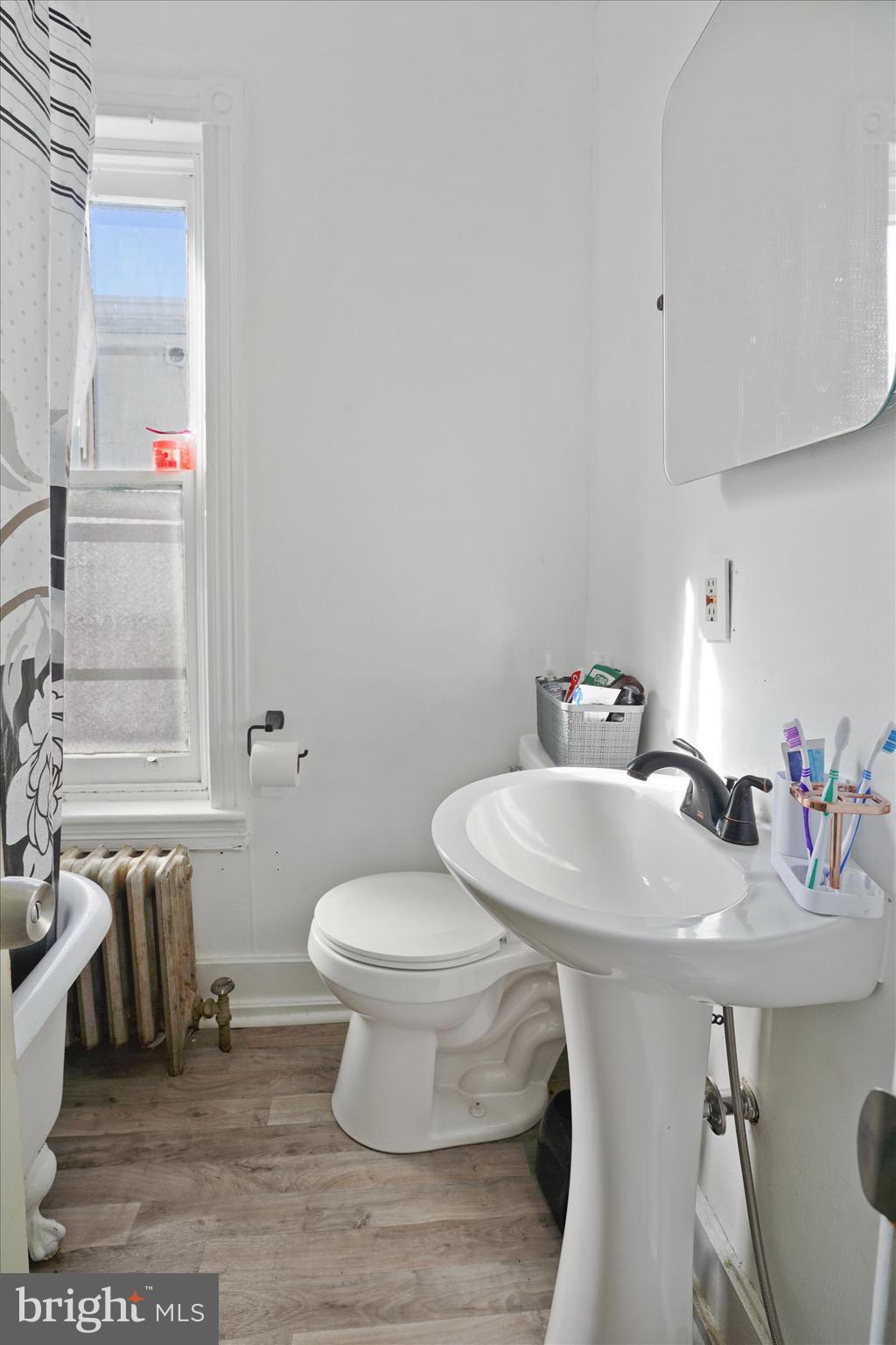 933 North 12th Street Reading, PA 19604 - Photo 22 of 26 a bathroom with a sink and a toilet