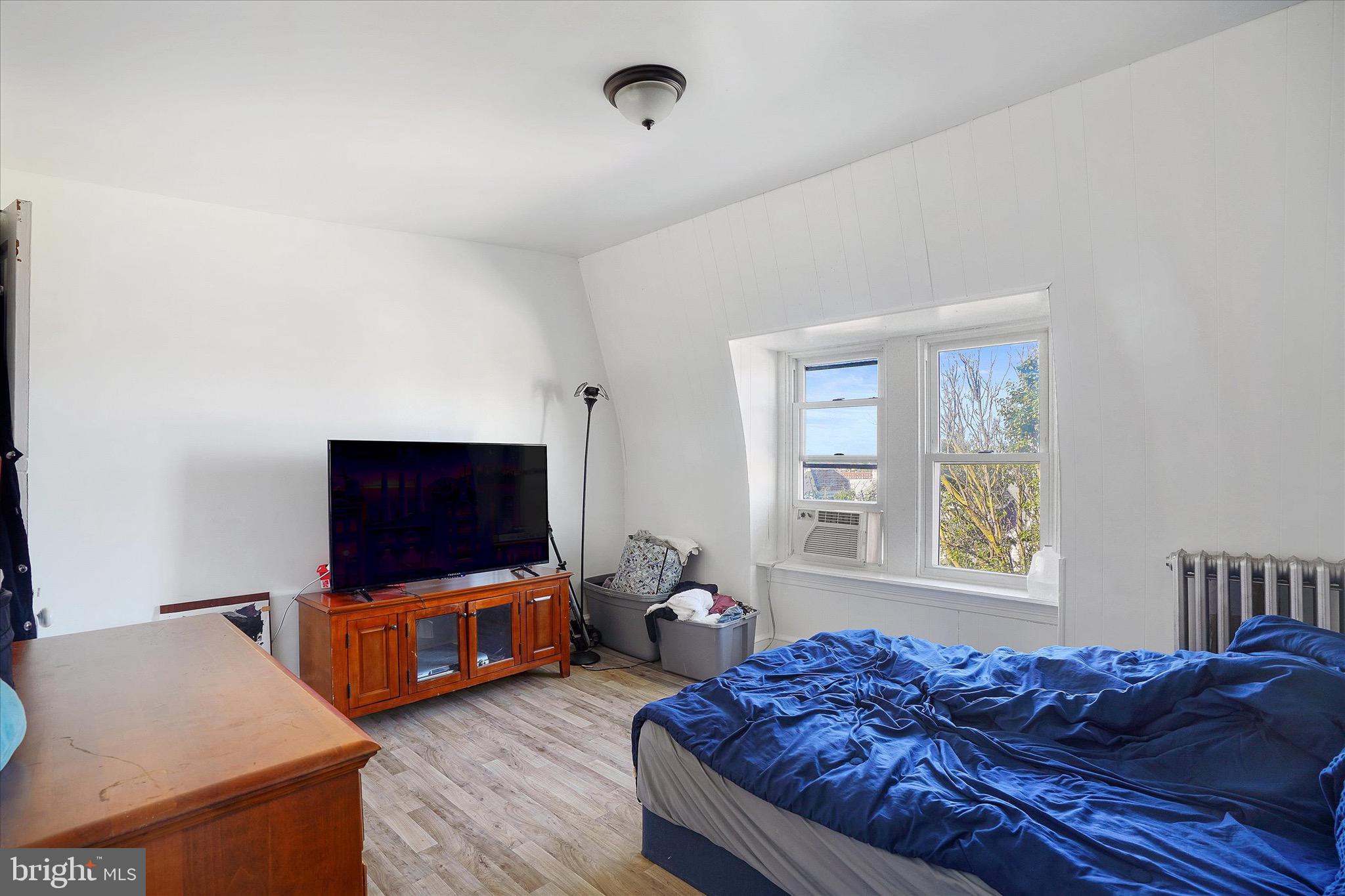 933 North 12th Street Reading, PA 19604 - Photo 24 of 26 a living room with furniture and a flat screen tv