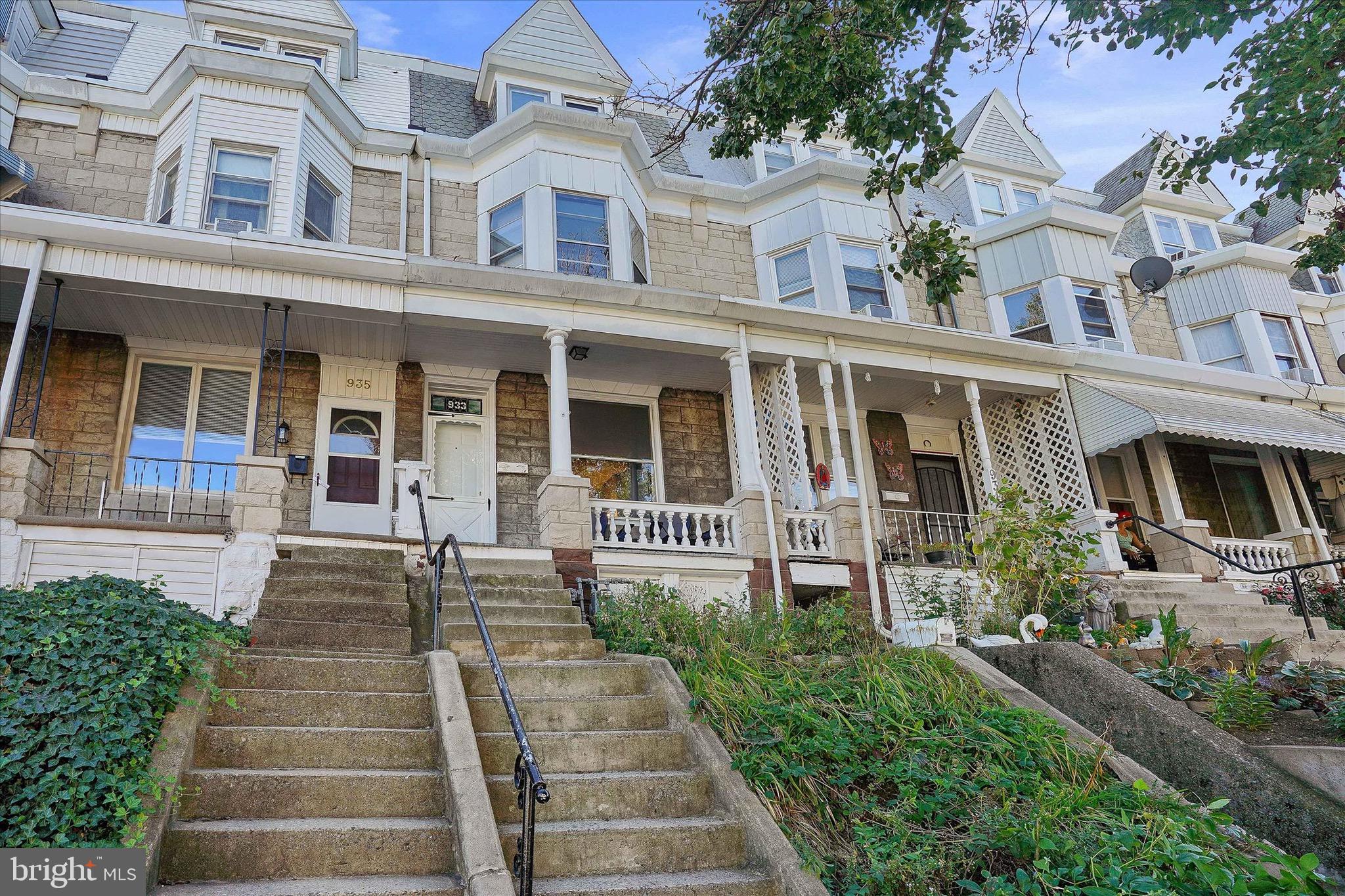 933 North 12th Street Reading, PA 19604 - Photo 3 of 26 front view of a house with a yard