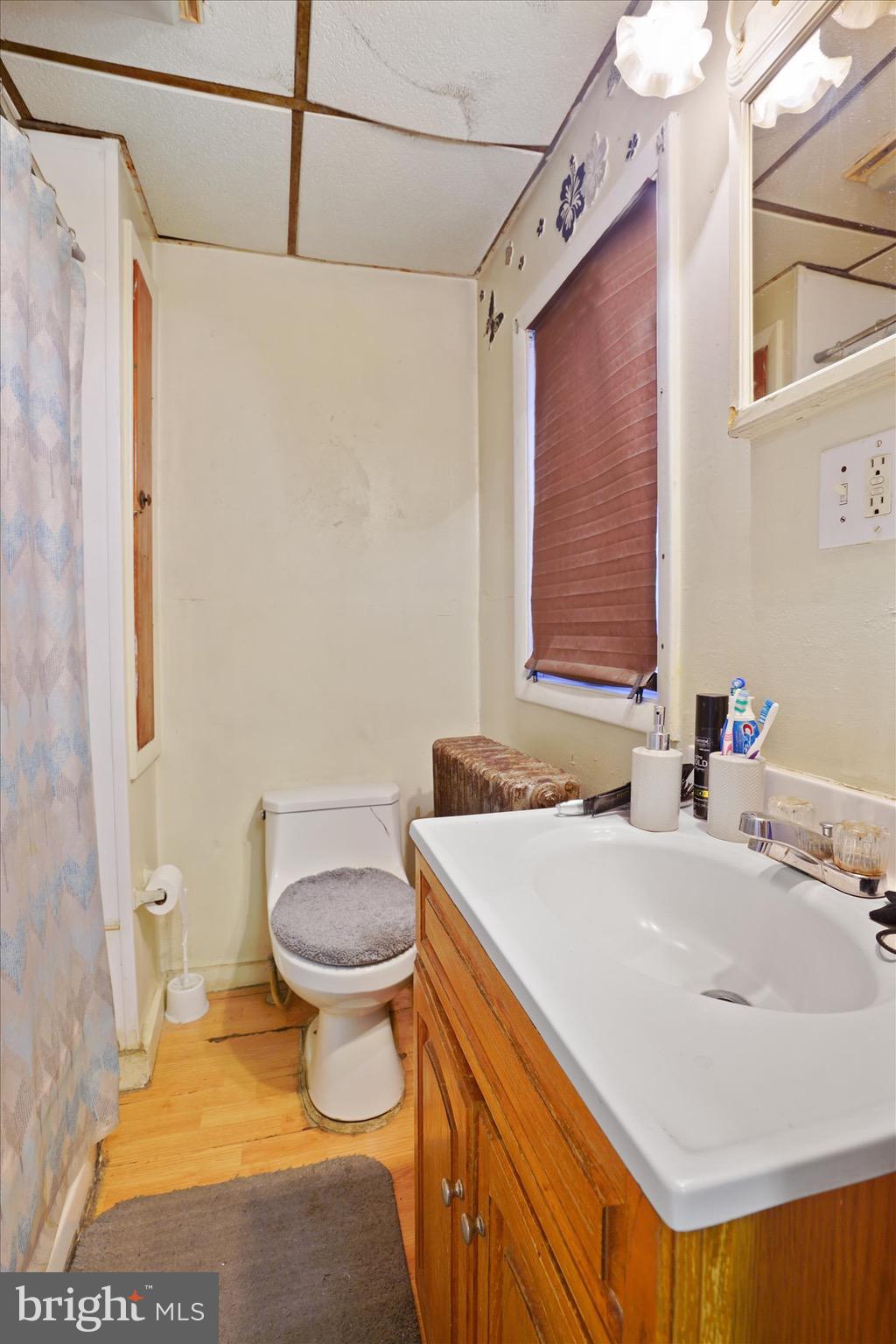 933 North 12th Street Reading, PA 19604 - Photo 10 of 26 a bathroom with a sink a toilet and shower