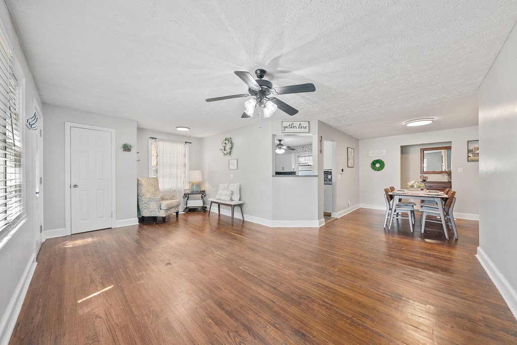 831 53rd Street Columbus, GA 31904 - Photo 3 of 37 a view of work space with furniture and wooden floor