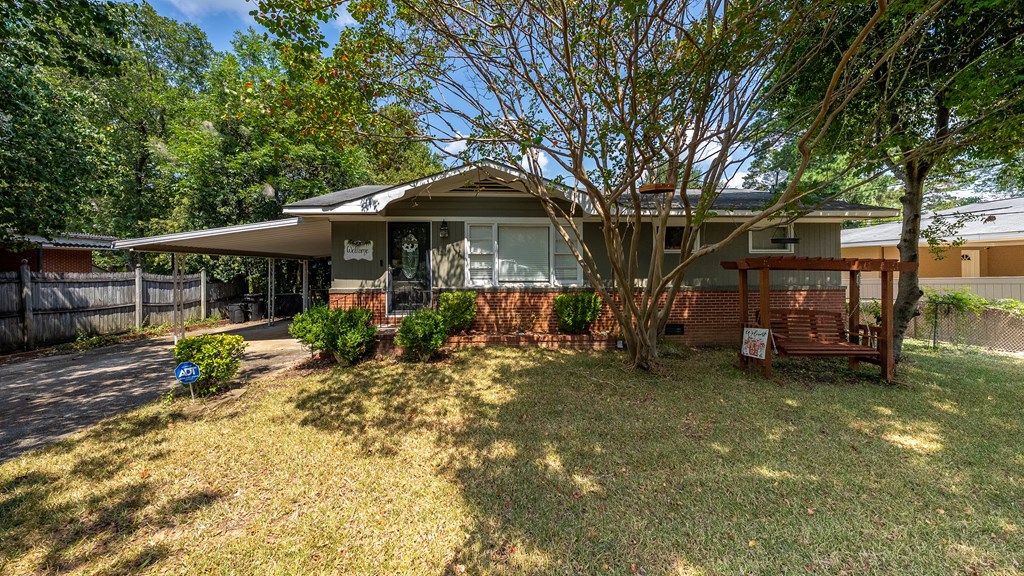831 53rd Street Columbus, GA 31904 - Photo 34 of 37 a front view of a house with garden