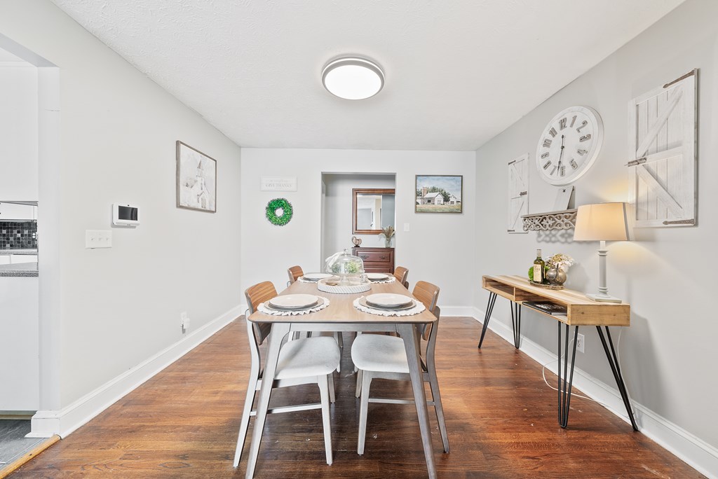 831 53rd Street Columbus, GA 31904 - Photo 5 of 37 a view of a dining room with furniture and wooden floor
