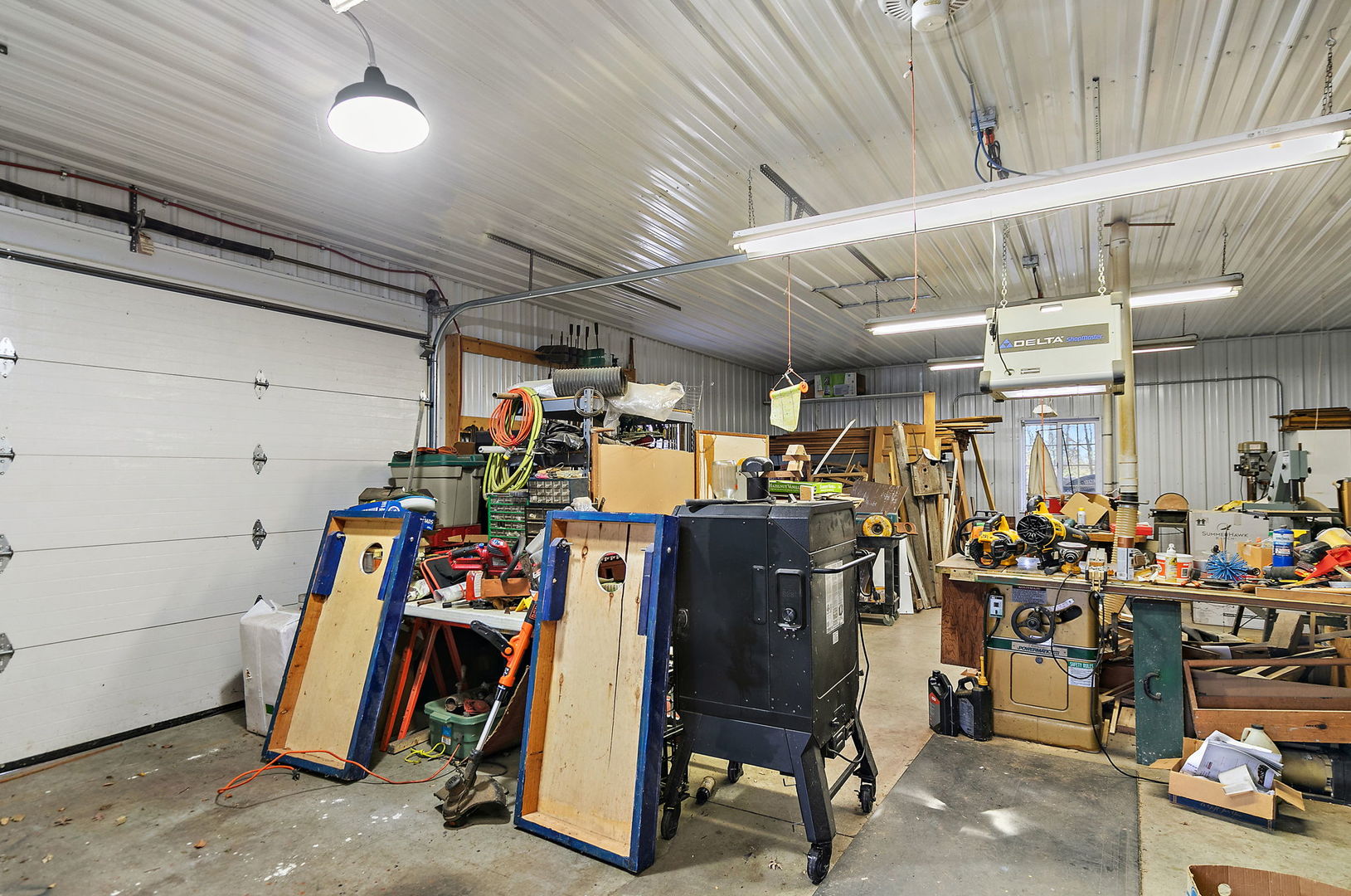 1313 Woods Road Belvidere, IL 61008 - Photo 32 of 50 a view of a storage room with lots of appliances