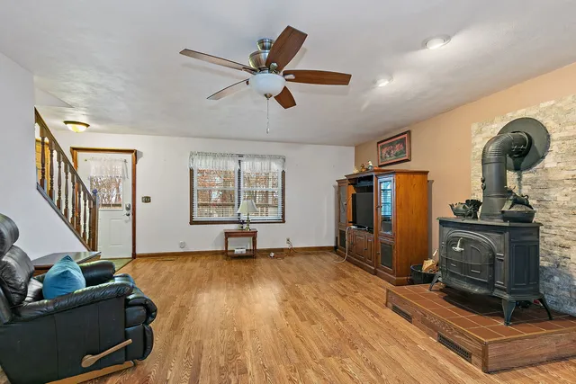 a view of livingroom with hardwood floor and windows