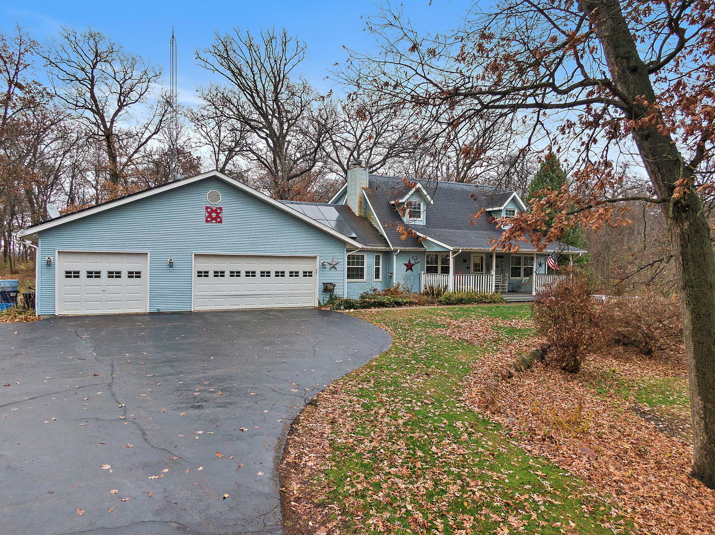 1313 Woods Road Belvidere, IL 61008 - Photo 43 of 50 a view of a house with a yard and large tree