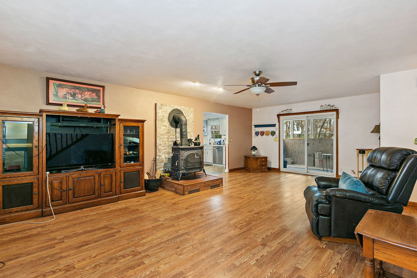 1313 Woods Road Belvidere, IL 61008 - Photo 5 of 50 a living room with furniture and a flat screen tv