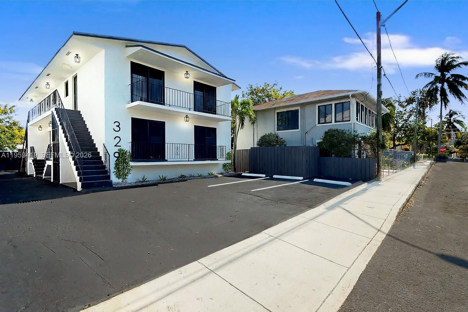 329 Southwest 9th Avenue Miami, FL 33130 - Photo 2 of 97 a front view of a house with a garage