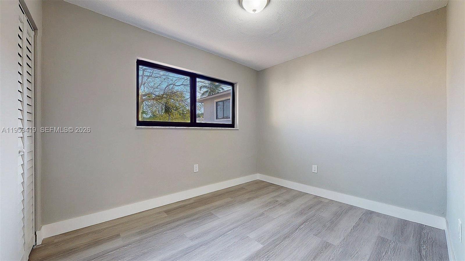 329 Southwest 9th Avenue Miami, FL 33130 - Photo 72 of 97 wooden floor in an empty room