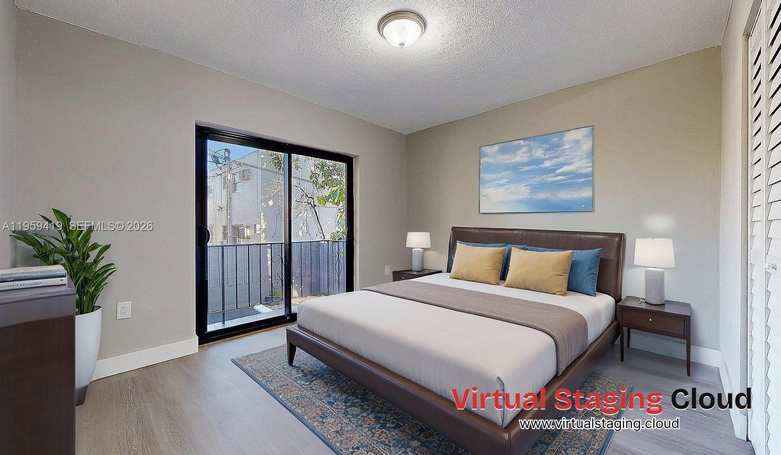 329 Southwest 9th Avenue Miami, FL 33130 - Photo 79 of 97 a bedroom with a bed and a potted plant