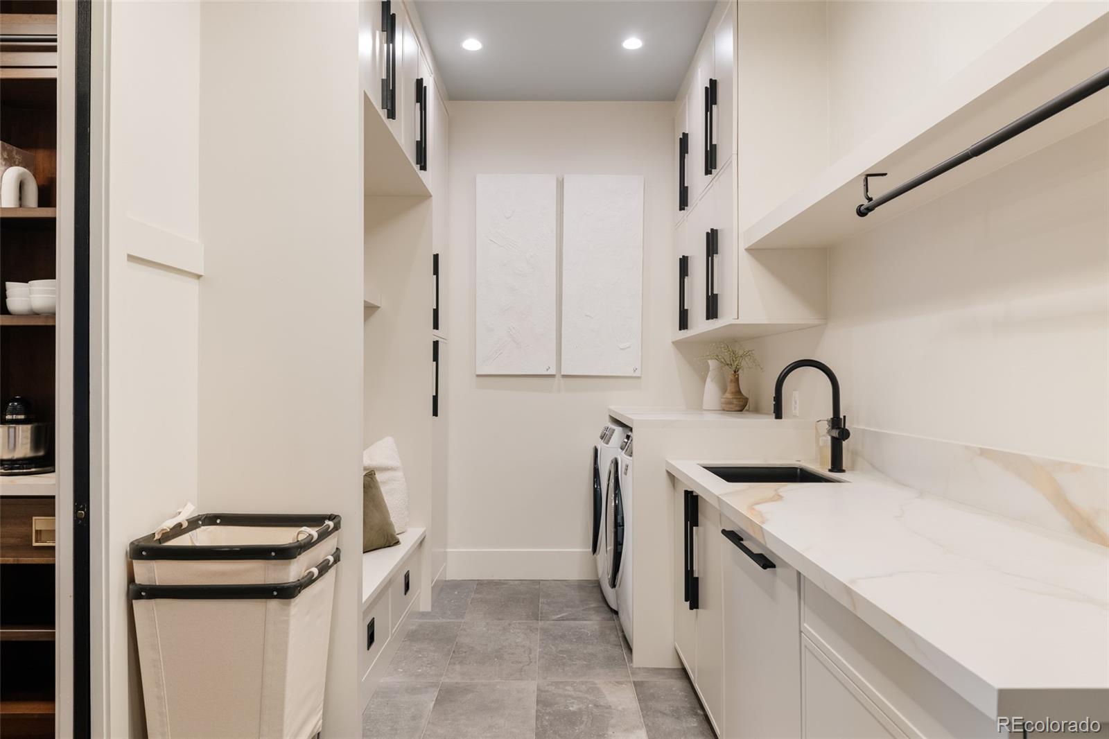 2531 Southwind Road Berthoud, CO 80513 - Photo 22 of 49 a kitchen with stainless steel appliances a sink and a refrigerator
