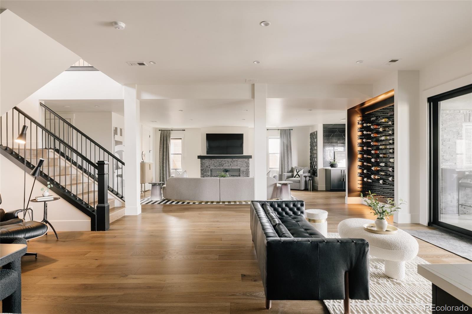 2531 Southwind Road Berthoud, CO 80513 - Photo 24 of 49 a living room with furniture and a flat screen tv