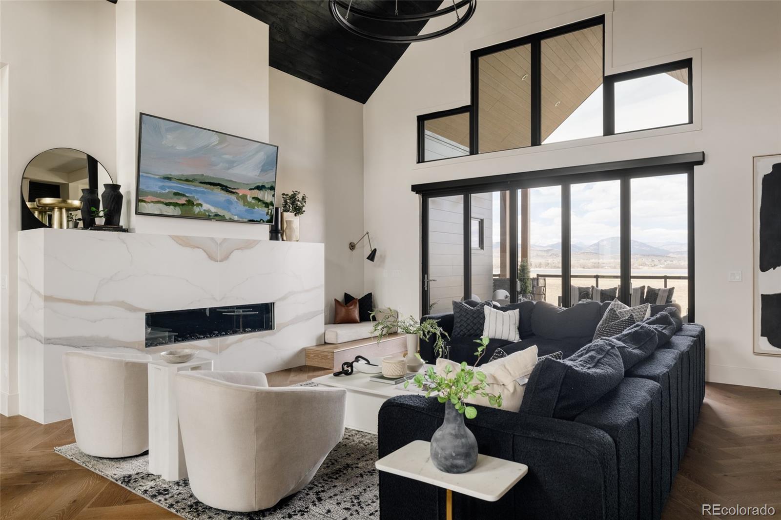 2531 Southwind Road Berthoud, CO 80513 - Photo 3 of 49 a living room with furniture and a large window