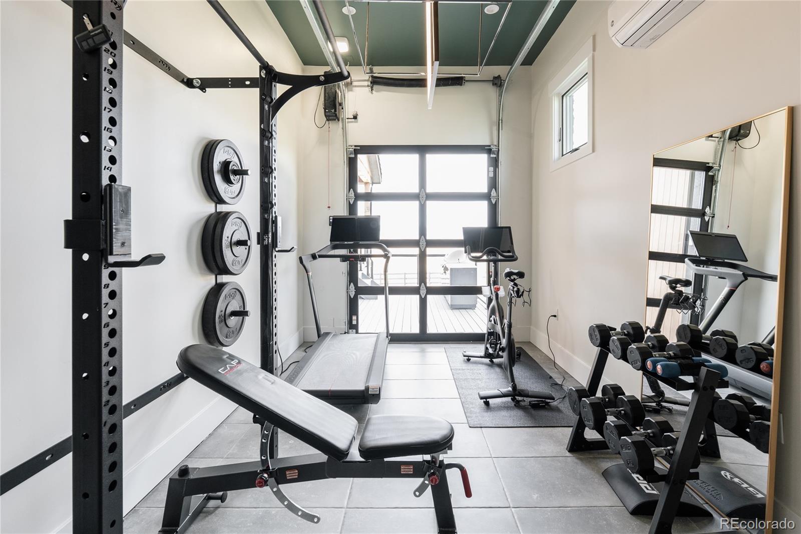 2531 Southwind Road Berthoud, CO 80513 - Photo 33 of 49 a view of a room with gym equipment