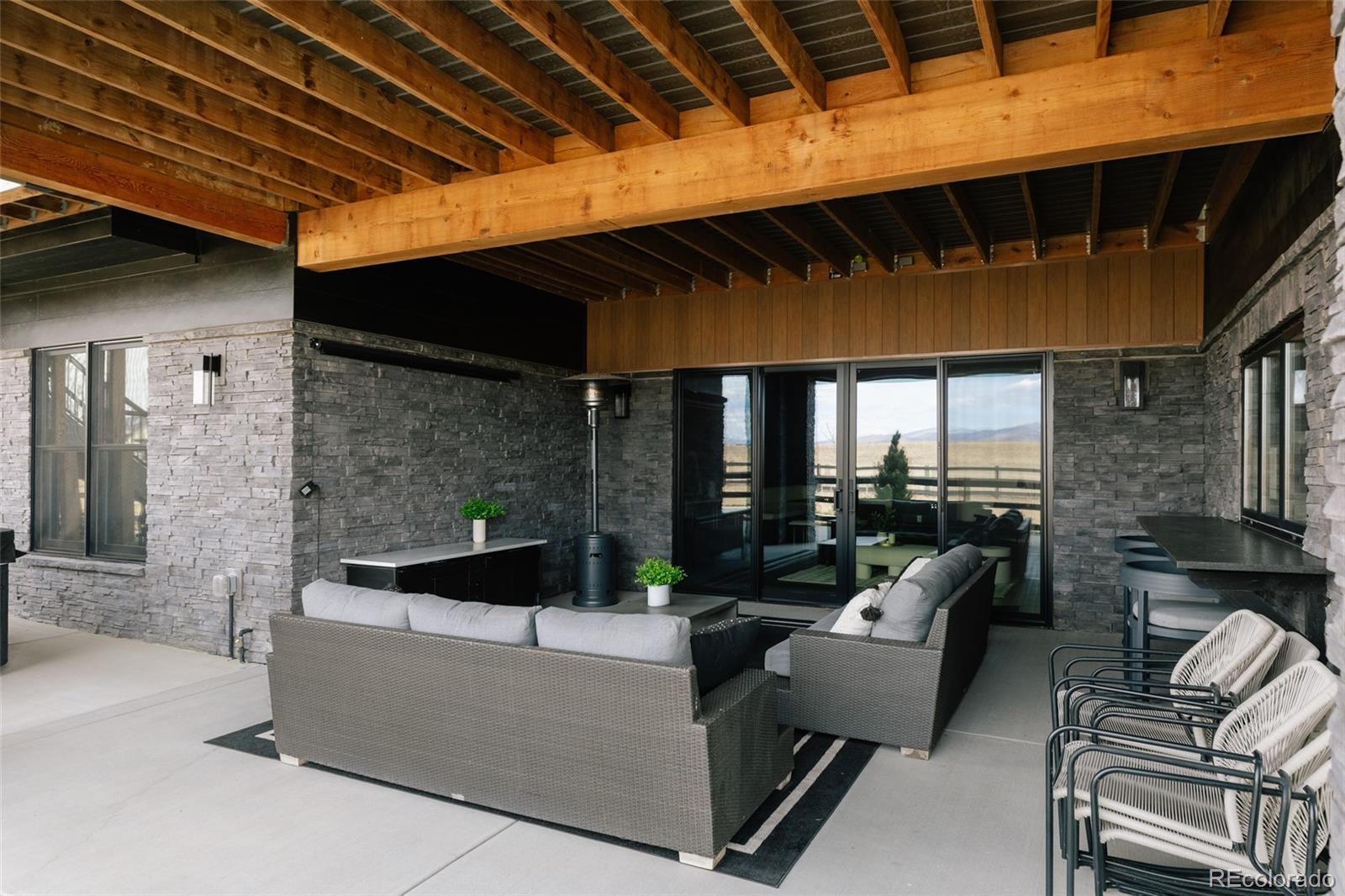 2531 Southwind Road Berthoud, CO 80513 - Photo 40 of 49 a outdoor living space with patio furniture and garden view