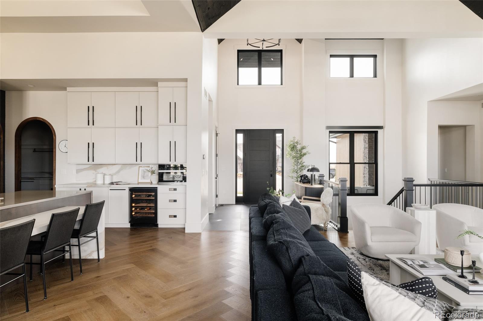 2531 Southwind Road Berthoud, CO 80513 - Photo 9 of 49 a living room with furniture and view of kitchen