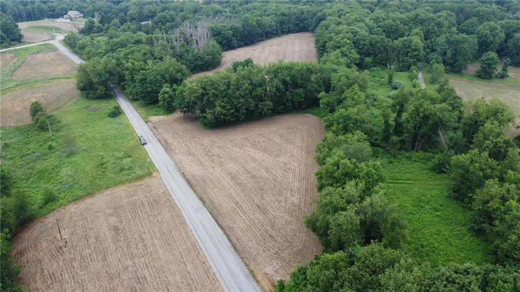 0 Mccloy Road Beaver Falls, PA 15010 - Photo 5 of 6 an aerial view of a house with a yard and lake view