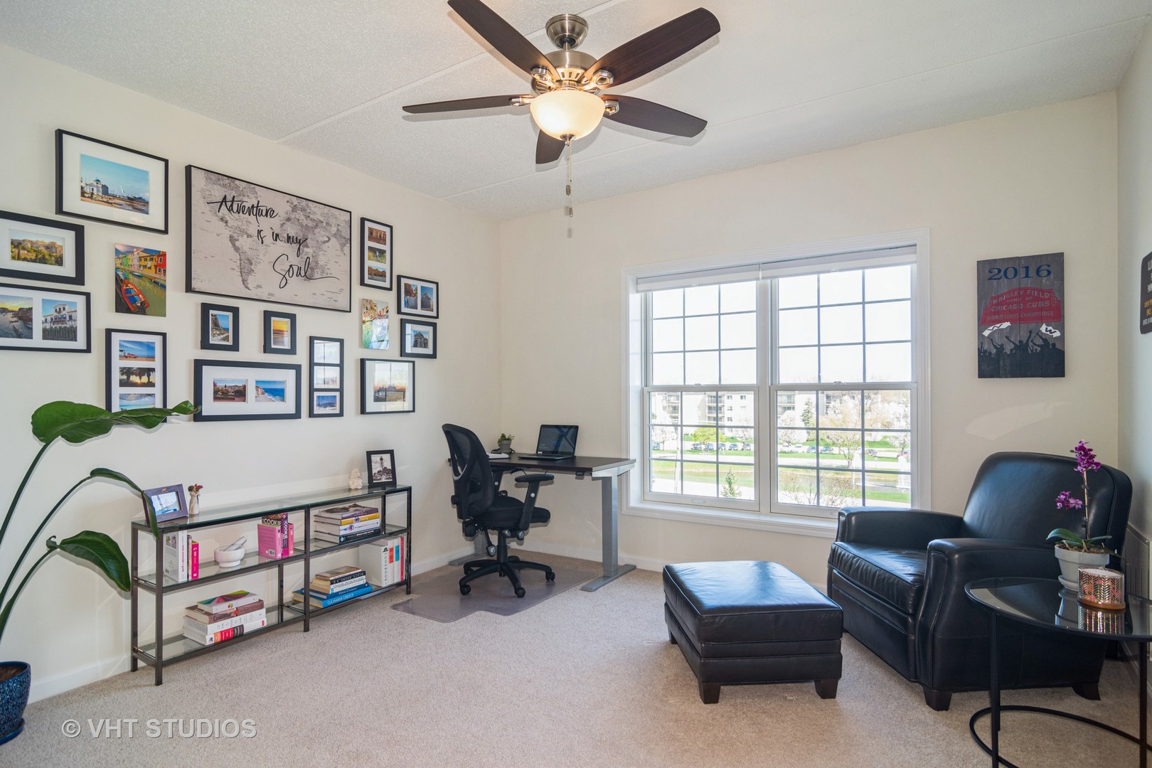 701 West Rand Road, Unit 423 Arlington Heights, IL 60004 - Photo 11 of 15 a bedroom with furniture and a window