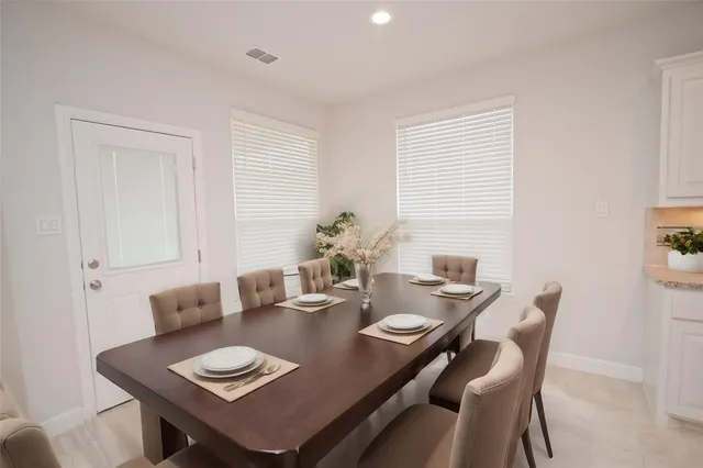 a view of an empty room with stairs