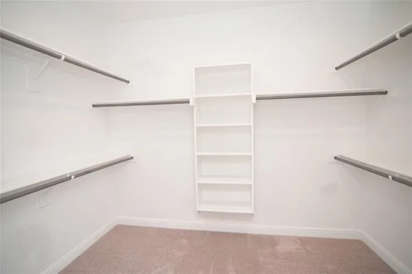 a view of kitchen with sink microwave and stove