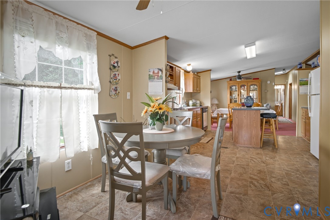 23344 Booth Road Stony Creek, VA 23882 - Photo 22 of 45 a view of a dining room with furniture window and outside view