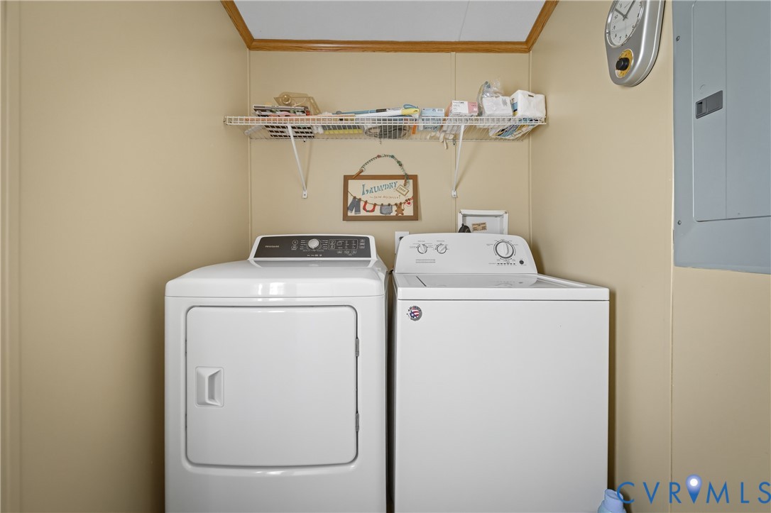 23344 Booth Road Stony Creek, VA 23882 - Photo 23 of 45 a utility room with dryer and washer