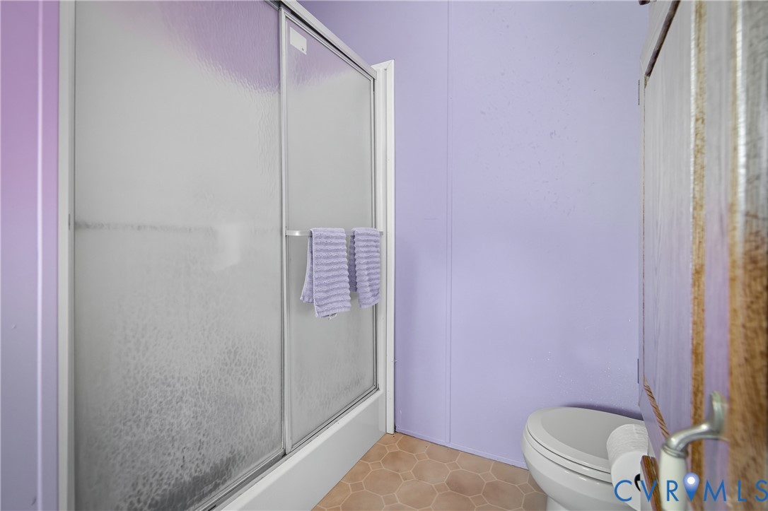 23344 Booth Road Stony Creek, VA 23882 - Photo 30 of 45 a bathroom with a shower