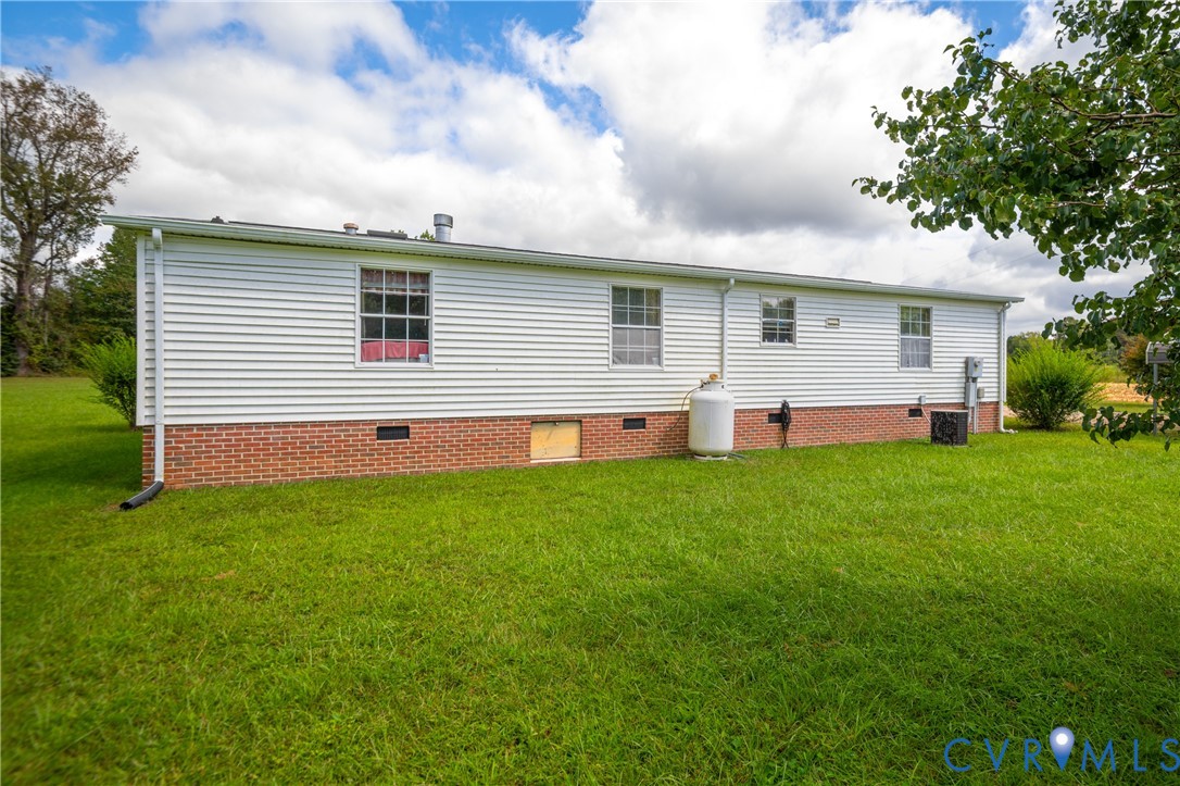 23344 Booth Road Stony Creek, VA 23882 - Photo 45 of 45 a view of a house with backyard