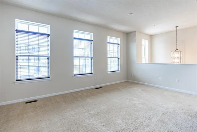 an empty room with windows