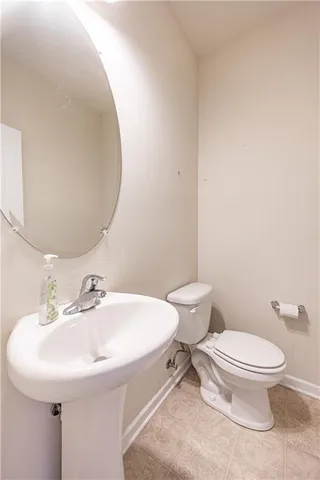 a bathroom with a sink and a toilet