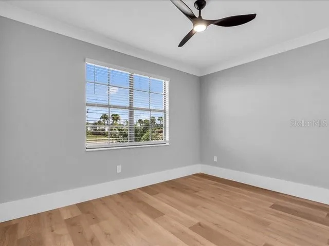 a bathroom with a double vanity sink and mirror