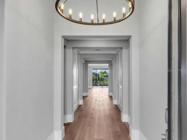 a view of a livingroom from a hallway